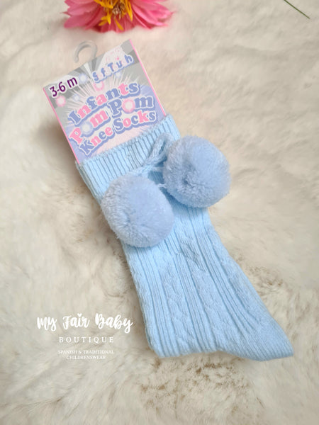 Kniehohe Pom Pom Socken im spanischen Stil