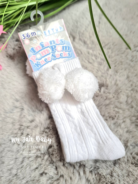 Kniehohe Pom Pom Socken im spanischen Stil