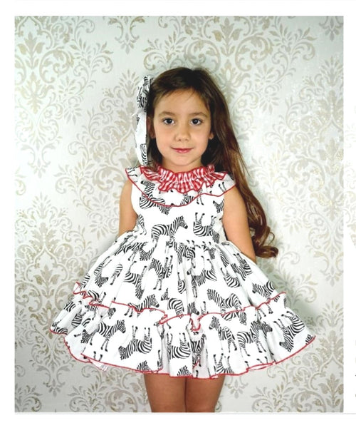 Clemencita Zebra Puffball Dress. SS21 collection. My Fair Baby Boutique